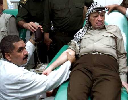 Yasser Arafat giving blood